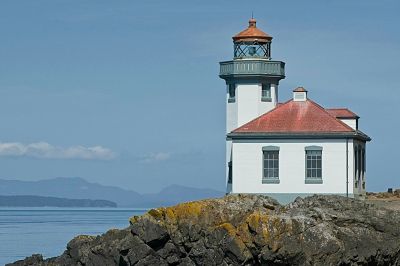 Lime Kiln Lighthouse at Friday Harbor in the San Juan Islands
I whish I had used a polarizing filter to cut through the background haze on this shot.  The lighthouse itself came out well, but not the hazy background.
