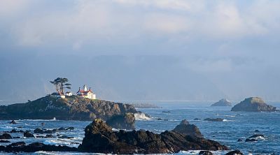 The Eye - Battery Point Lighthouse
Because the immediate grounds were closed we sought out a distant vantage point.  We found one along the shoreline drive near Brother Jonathan Park in time for the sunset.  This shot was the one that made us realize we need a 70-200mm zoom lense in our kit.
